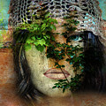 The face with the green leaves